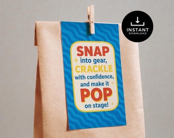 May include: A brown paper bag with a blue tag attached by a wooden clip. The tag has the words "SNAP, CRACKLE, POP" in red and yellow, with the text "INSTANT DOWNLOAD" in a black circle.