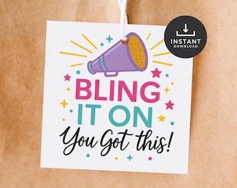May include: A white gift tag with the text "BLING IT ON You Got this!" in pink, teal, and black script. A purple megaphone with a gold glitter horn is at the top. The tag is decorated with stars and yellow rays. A black circle with the words "INSTANT DOWNLOAD" is on the right.