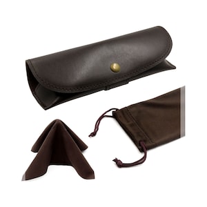 May include: A brown leather glasses case with a gold button closure. The case is accompanied by a brown microfiber cleaning cloth and a brown drawstring pouch.