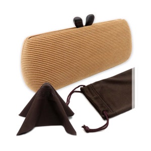 May include: A tan woven fabric eyeglass case with a wooden clasp. The case comes with a brown microfiber cleaning cloth and a brown drawstring pouch.