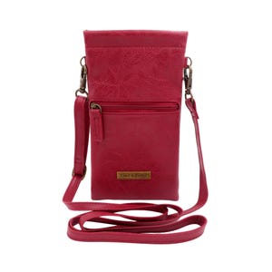 May include: A red faux leather crossbody phone bag with a zippered pocket and a gold metal logo that says "Katie Velvet".