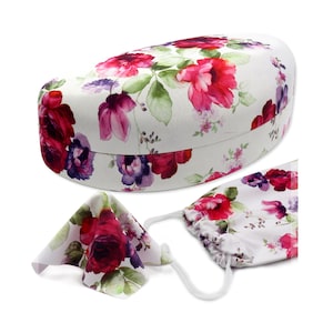 May include: A white oval-shaped glasses case with a floral pattern in shades of pink, purple, and green. The case comes with a matching floral drawstring bag and a cleaning cloth.