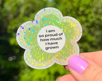 I am proud of how I have grown -- Self Care Garden Flower Pastel Rainbow Glittery Holographic Sticker