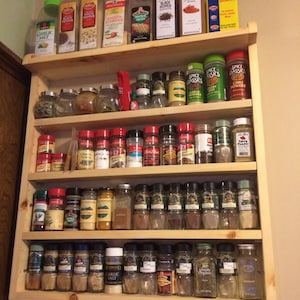 Customizable spice rack, movable shelves, ornate large storage top shelf, assorted wood types, custom