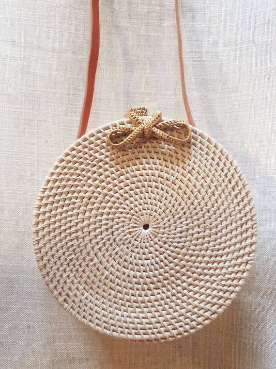 white rattan bag round