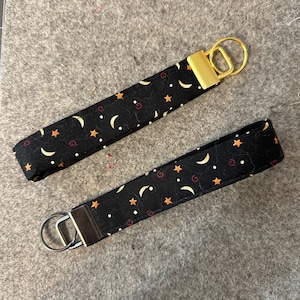 Llavero/manguito de muñeca: estrellas, lunas, cielo nocturno, cuadros, mezclilla