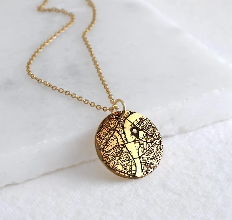 Personalized map necklace in gold stainless steel with engraved city map detail pendant