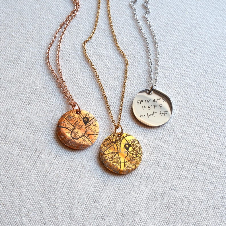 Custom engraved necklaces in gold, rose gold and silver with map and coordinates designs