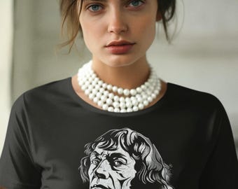May include: A black t-shirt with a white graphic of a man's face and the signature "Nuf Copenut".