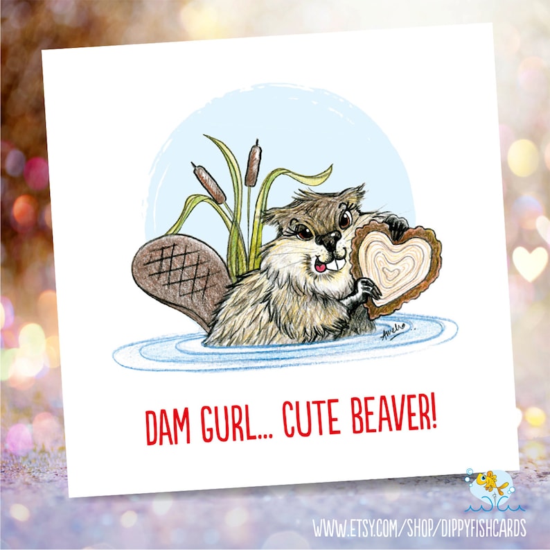 May include: A cartoon beaver holding a heart-shaped cookie with the text "DAM GURL... CUTE BEAVER!"  The beaver is in a pond with cattails in the background.