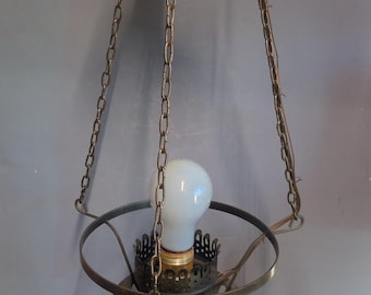May include: A brass hanging lamp with a white glass shade and a decorative chain.