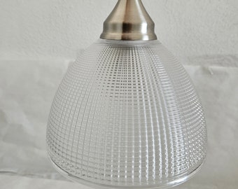 May include: A silver pendant light with a clear, textured glass shade.