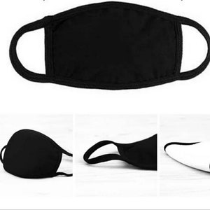 May include: A black cotton face mask with elastic ear loops. The mask is plain and has no design.