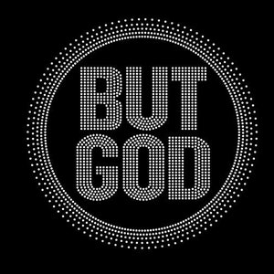 May include: A black and white graphic design of the words "BUT GOD" in a circle of white dots.