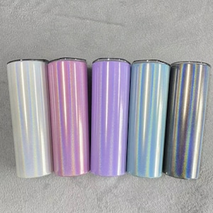 May include: Five stainless steel tumblers with iridescent finishes in white, pink, purple, blue, and gray.