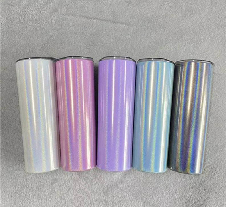 May include: Five stainless steel tumblers with iridescent finishes in white, pink, purple, blue, and gray.