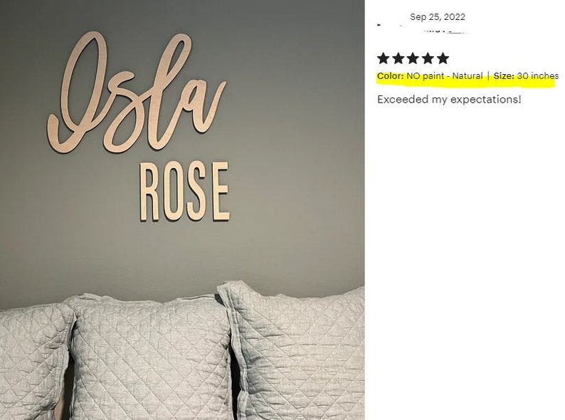 May include: A wooden sign with the name "Isla Rose" in cursive lettering. The sign is 30 inches long and is unpainted, showing the natural wood color. The sign is mounted on a gray wall.