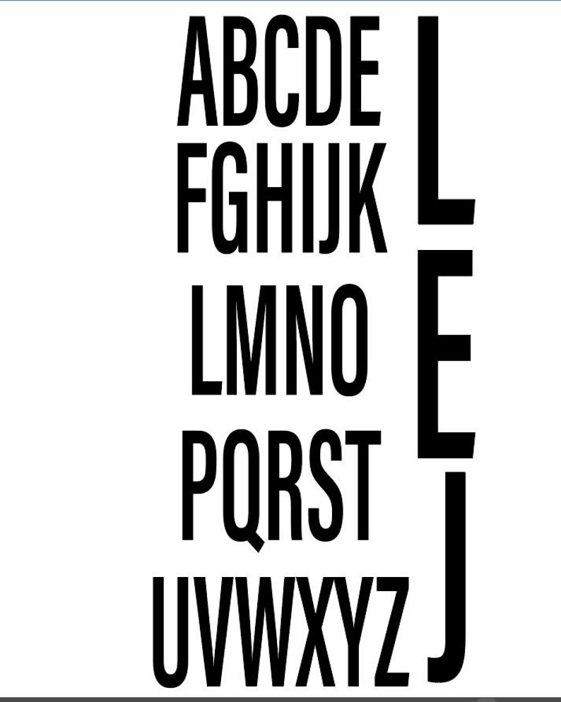 May include: Black and white alphabet letters in a bold font style. The letters are arranged in rows, with the letters A through J in the top row, L through O in the second row, P through T in the third row, and U through Z in the bottom row. The letters E and J are on the right side of the image, standing vertically.