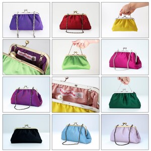 May include: Ten different colors of small, satin clutch purses with a metal clasp and chain strap. The purses are all closed and arranged in three rows of three purses each.