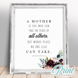 Puede incluir: Una cita imprimible sobre la maternidad con un diseño floral en tonos rosa, rojo y azul. La cita dice: "Una madre es aquella que puede tomar el lugar de todos los demás, pero cuyo lugar nadie más puede tomar." - Caspar W. Neihilliod