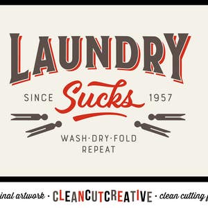 May include: A brown and red graphic design with the text "Laundry Sucks" and the years "Since 1957". The graphic also includes the text "Wash Dry-Fold Repeat" and two stylized scissors.