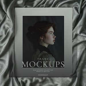 May include: A framed print mockup featuring a portrait of a woman in profile. The print is set against a gray background, with the words "FRAME MOCKUPS" and "SILK & PAPER COLLECTION PRINTS & MATTES" displayed. The overall aesthetic is elegant and vintage.