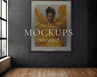 May include: A rectangular dark wood frame containing a print of a person wearing a flowing yellow garment. The text reads FRAME MOCKUPS ASH & ECHO COLLECTION JAPANDI MINIMALISM. The frame is mounted on a dark gray wall above a wooden floor.