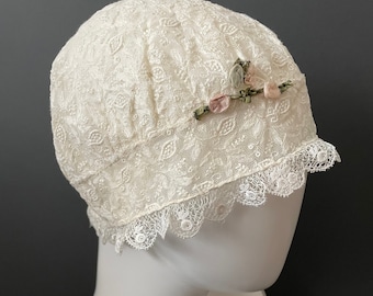A vintage lace cap circa 1920s in ivory.