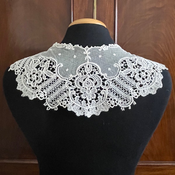 An antique shiffli lace collar in ivory