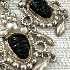 Long Mexican Aztec Warrior Mictlantecuhtli  Dangle Earrings (1935-1945, Sterling Silver & Onyx, 2.25”)