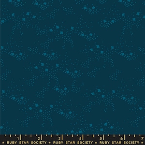 May include: Dark teal fabric with a repeating pattern of small dots and four-petal flower shapes in a lighter teal color. The fabric has a speckled appearance. The words "RUBY STAR SOCIETY" are printed at the bottom.