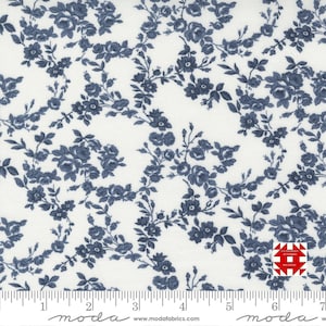 May include: White fabric with a repeating pattern of blue floral vines and blossoms. The design features detailed roses and leaves, creating a classic, elegant look. The fabric is suitable for quilting and other craft projects.