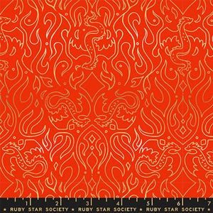 May include: A vibrant orange fabric featuring a repeating pattern of gold-colored line art depicting stylized dragons and flames. The bottom edge includes a black selvage strip with the repeating white text Ruby Star Society and a ruler.