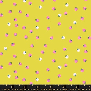 May include: A fabric with a bright yellow background scattered with pink and white strawberries. The strawberries have green stems. The text "RUBY STAR SOCIETY" is printed at the bottom of the fabric.