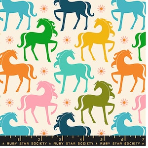 May include: Fabric with a repeating pattern of colorful horses in shades of blue, green, orange, yellow, and pink, with small daisy accents on a cream background. The text "RUBY STAR SOCIETY" is at the bottom.
