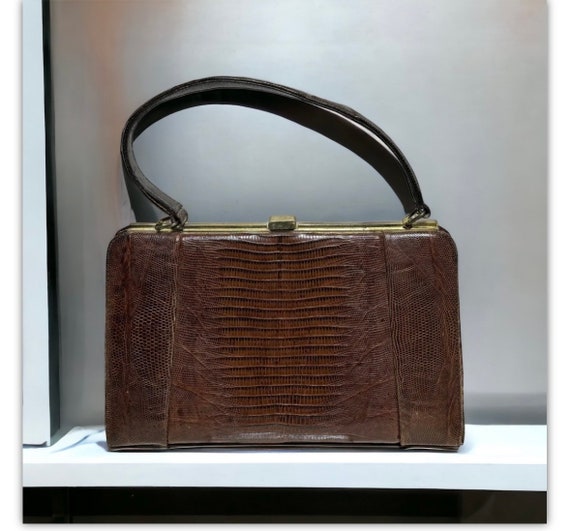 KELLY DE VOYAGE 50 bag, 2012 Havana swift leather Silv…