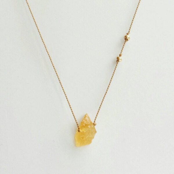 Raw yellow Citrine gemstone silk cord minimalist necklace. Drilled raw nugget on simple fine silk cord with 14 K gold filled beads. Minimal
