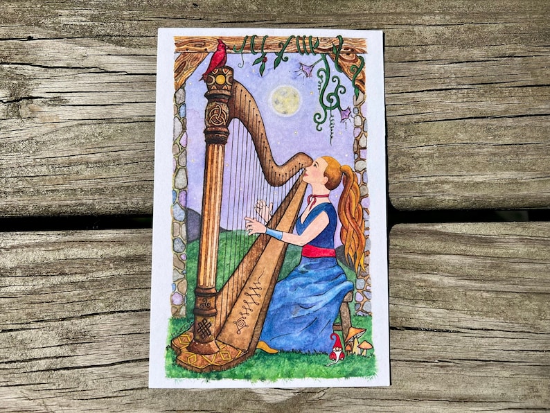 Joanna Newsom inspired woman playing Celtic harp outside at twilight under full moon
