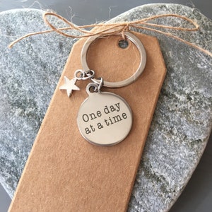 One day at a time keyring