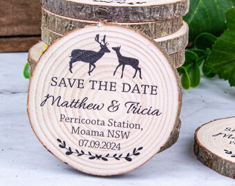 May include: Save the date announcement on a wooden disc with a couple of deer silhouettes, the text "Save the Date Matthew & Tricia Perricoota Station, Moama NSW 07.09.2024" and a leafy border.