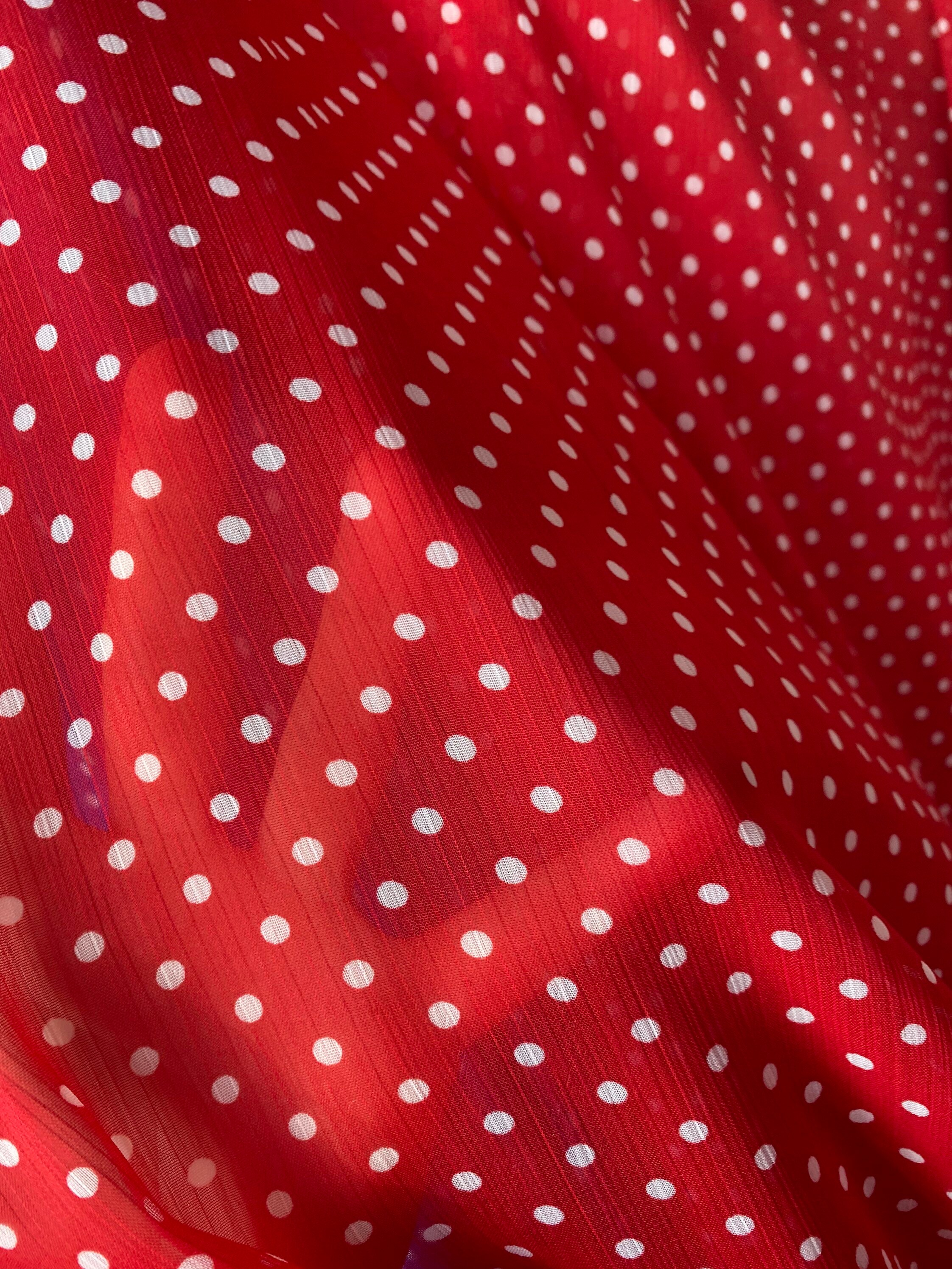 Red and white polka dot chiffon fabric deals