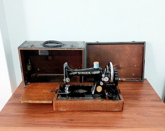 Machine à coudre Singer vintage avec boîte