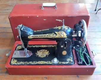 Máquina de coser Singer eléctrica antigua