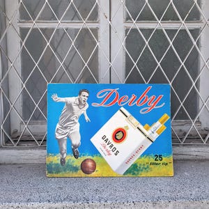 Letrero publicitario de cigarrillos Davros Derby de cartón vintage desplegable