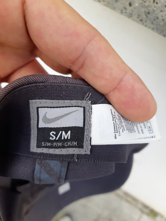 Gorra nike top letras chinas