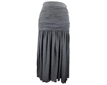May include: A long, gray skirt with a gathered waistband and a flowing, A-line silhouette.