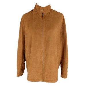May include: A brown suede jacket with a zipper closure and a stand-up collar.