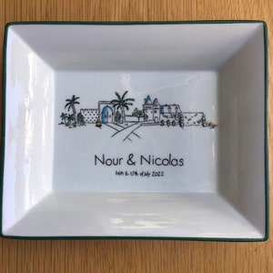 Reproduction of a wedding invitation on a service, initials of the bride and groom, breakfast set, trinket, tableware