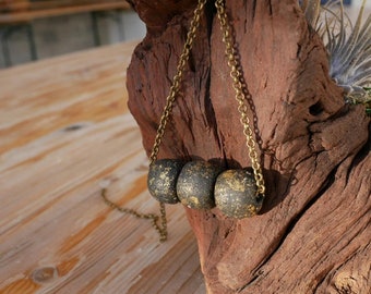 Collier en or et pyrite