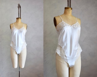 vintage 1980s NOS white satin and lace romper | 80s lace and satin teddy | vintage new old stock bodysuit lingerie | bride wedding lingerie